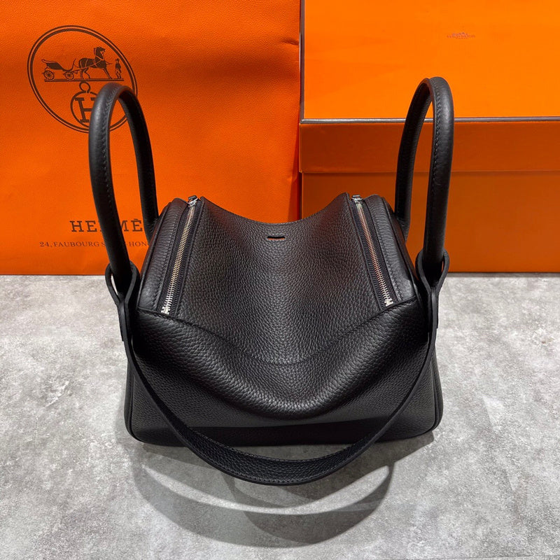 Side view of sophisticated structured handbag