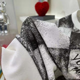 Full styled look of Louis Vuitton luxury clothing with streetwear-inspired cut