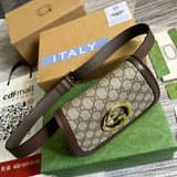 Handle and strap detail of polished modern women's handbag – women's designer-style accessory