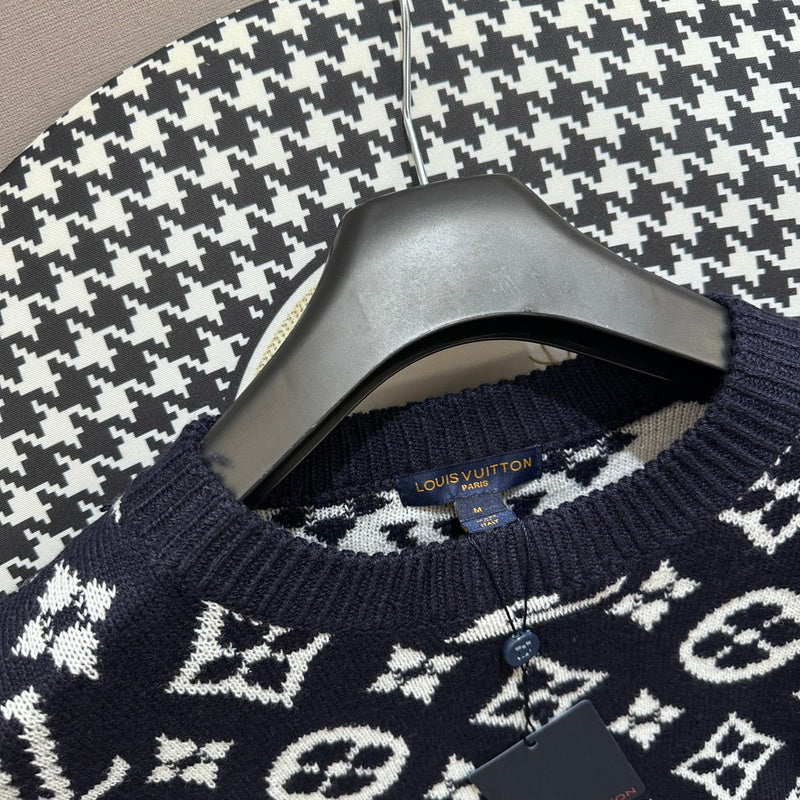 Flat lay presentation of Louis Vuitton luxury clothing with everyday silhouette