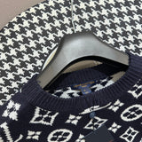 Flat lay presentation of Louis Vuitton luxury clothing with everyday silhouette