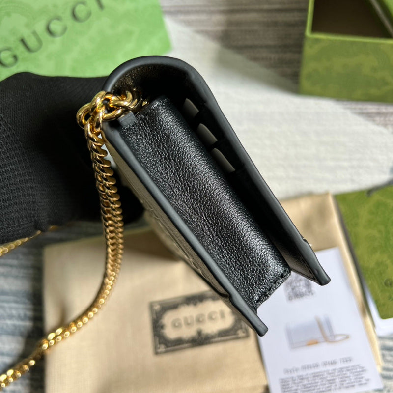 Handle and strap detail of polished elevated women's handbag – women's designer-style accessory