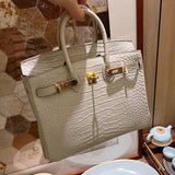 Side view of modernist structured handbag
