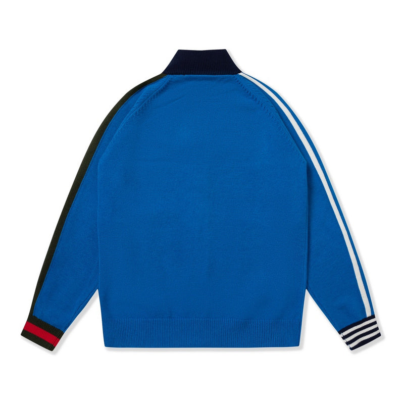 Side profile of Gucci luxury clothing with logo-detail design