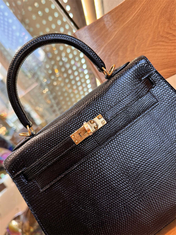Side view of sleek structured handbag