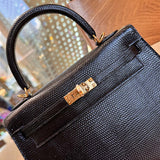 Side view of sleek structured handbag