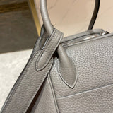 Side view of effortless structured handbag