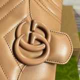 Back view of sleek elevated women's handbag – women's statement bag