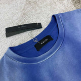 Close-up detail view of Amiri luxury piece style No.033