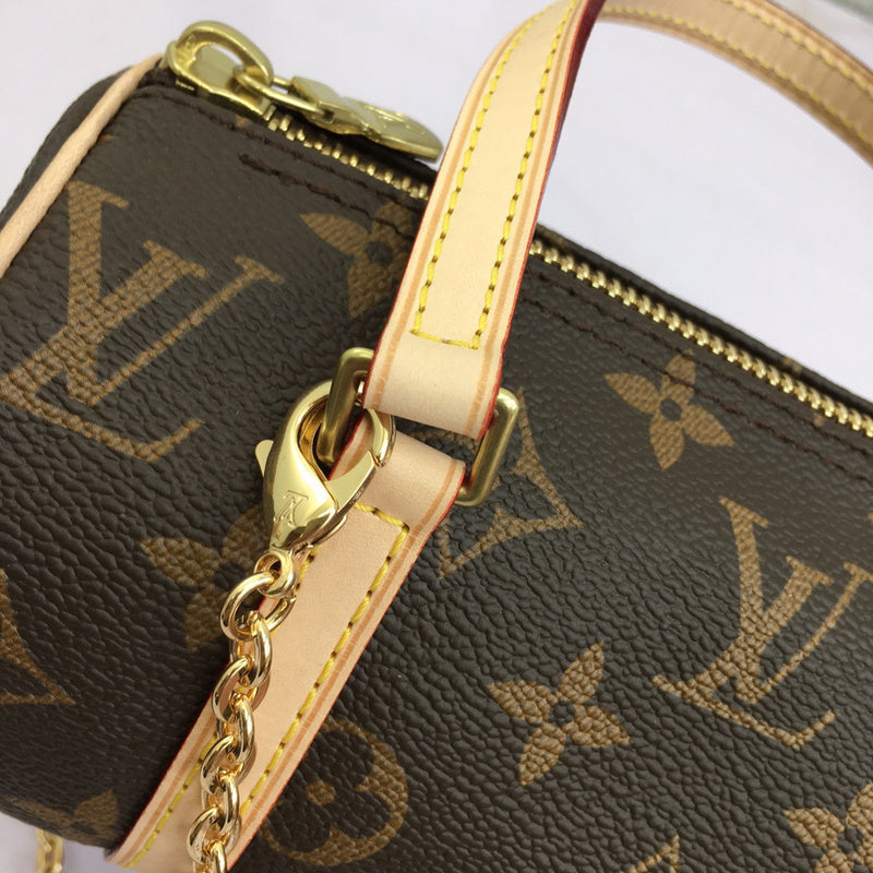 Back view of polished signature women's handbag – women's luxury accessory