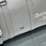 Close-up detail of everyday-luxe signature women's handbag – women's designer-style accessory