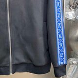 Flat lay presentation of Louis Vuitton luxury clothing with runway-inspired design