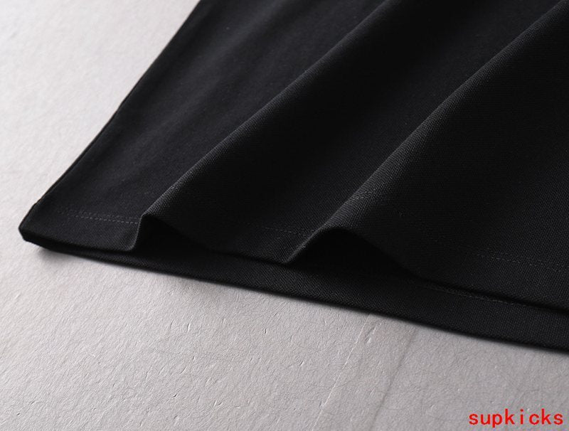 Close-up detail shot of Moncler luxury clothing with relaxed-fit cut