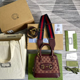 Front view of elevated sleek women's handbag – women's luxury accessory