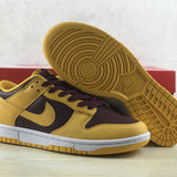 Side profile of Nike soft grey sneakers chunky sole construction
