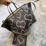 Ziva's Charm handbag – front view (one versatile size)