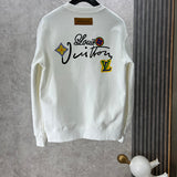 Side profile of Louis Vuitton luxury clothing with logo-detail design
