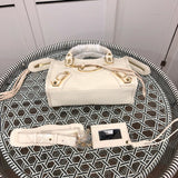 Handle and strap detail of statement everyday-luxe women's handbag – women's statement bag