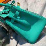 Side view of refined structured handbag