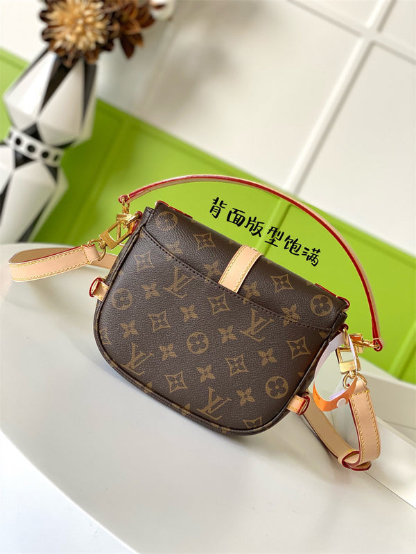  Structured crossbody bag carried on shoulder