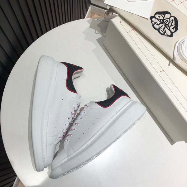 Alexander McQueen classic monochrome luxury sneakers view 5 heritage-inspired look
