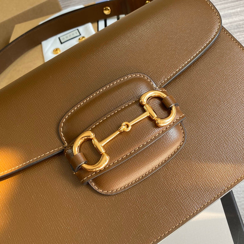 Handle and strap detail of premium modern women's handbag – women's luxury handbag