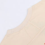 Side profile of Rhude luxury clothing with streetwear-inspired cut
