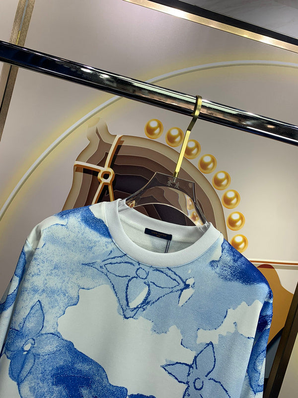 Full styled look of Louis Vuitton luxury clothing with signature branding