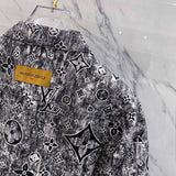 Side profile of Louis Vuitton luxury clothing with label-forward styling