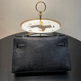 Statement handbag styled for everyday wear