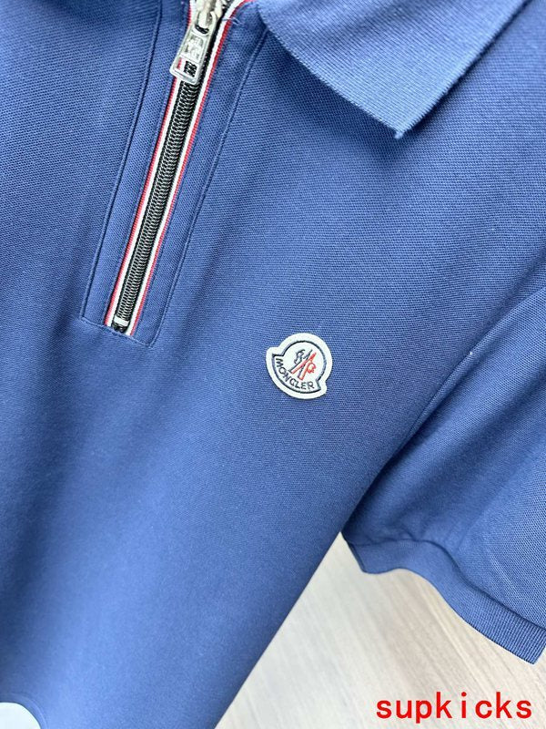 Flat lay presentation of Moncler luxury clothing with tailored silhouette