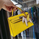  effortless top-handle bag styled with outfit
