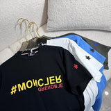 Close-up detail shot of Moncler luxury clothing with signature branding