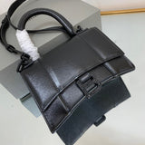 Zivas Charm Chic Craftsmanship Statement Handbag (Contemporary Shape Language) – Styled Look