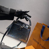  curated top-handle bag detail view showing craftsmanship 14