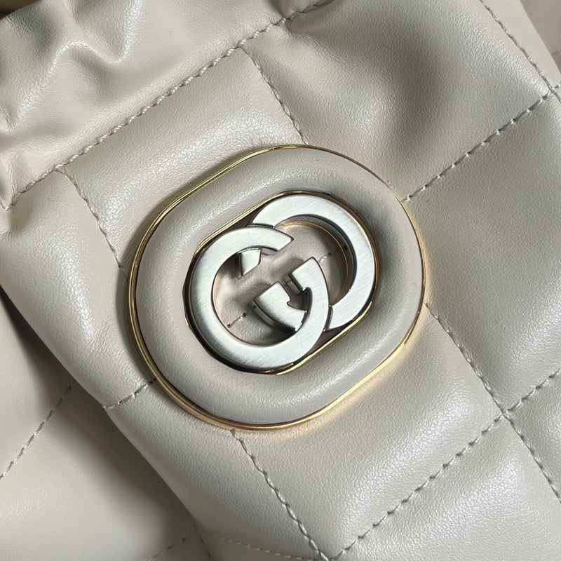 Side profile of chic signature women's handbag – women's statement bag