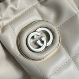 Side profile of chic signature women's handbag – women's statement bag