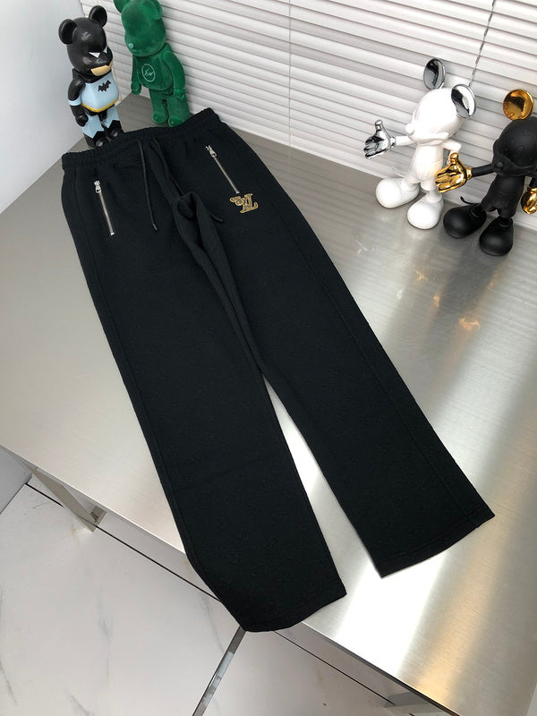 Side profile of Louis Vuitton luxury clothing with signature branding