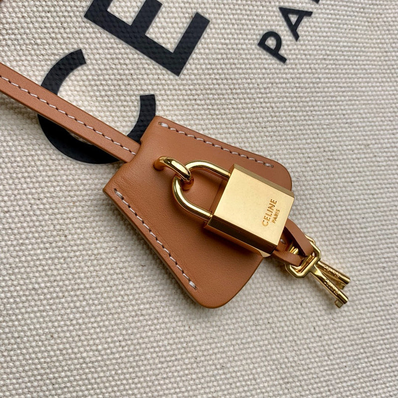 Handle and strap detail of chic modern women's handbag – women's designer-style accessory