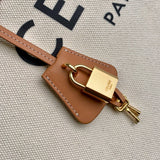 Handle and strap detail of chic modern women's handbag – women's designer-style accessory