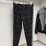 Close-up detail shot of Louis Vuitton luxury clothing with everyday silhouette