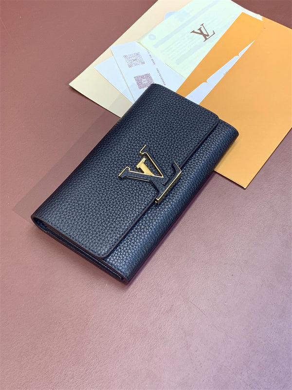  Tailored top-handle bag carried on shoulder