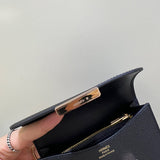 Side view of effortless structured handbag
