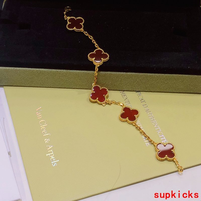 Lifestyle view of Van Cleef & Arpels unisex jewelry piece
