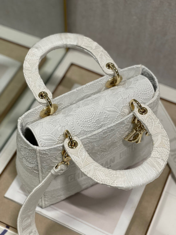 Handle and strap detail of chic classic women's handbag – women's designer-style accessory
