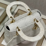 Handle and strap detail of chic classic women's handbag – women's designer-style accessory