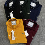 Close-up detail shot of Lacoste luxury clothing with logo-detail design