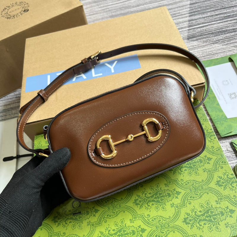 Handle and strap detail of refined signature women's handbag – women's designer-style accessory