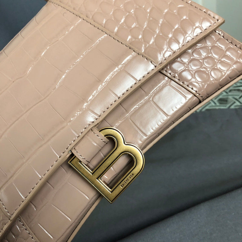 Side profile of classic structured women's handbag – women's statement bag
