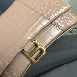 Side profile of classic structured women's handbag – women's statement bag